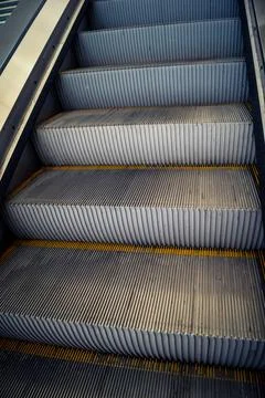 Escalators and subway platform inside San Bernardo metro station in central.. Stock Photos