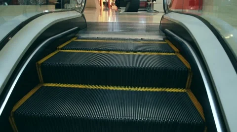 Escalators are shown that constantly run upstairs Видео 44117107