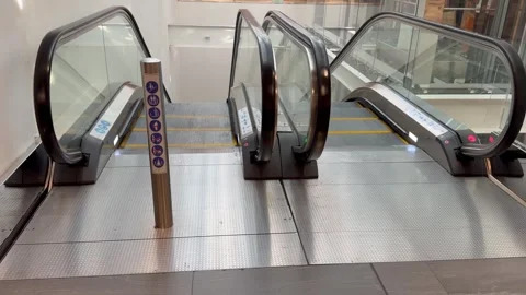 Escalators going up and down inside a shopping centre. Stock Footage 332616706