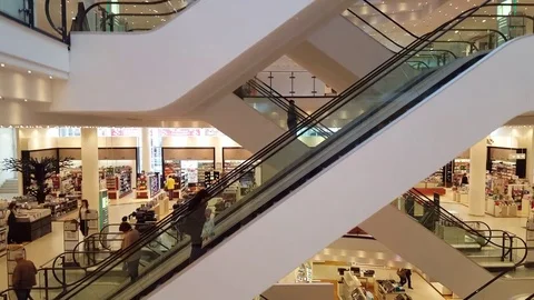 Escalators, huge department store shopping mall, elevator ride, Leipzig Stock Footage