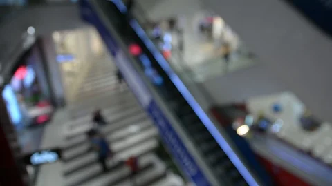 Escalators in the mall unfocused  Stock Footage 105346134