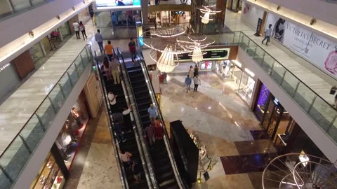 Escalators in modern shopping mall crowd of people. Stock Footage 220499293