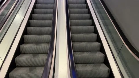 Escalators in motion Stock Footage 228726736
