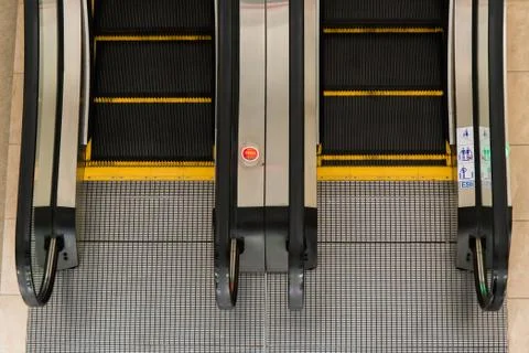 Escalators in a public building Stock Photos
