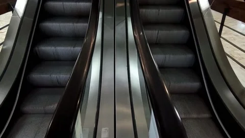 Escalators in a shopping complex Stock Footage 162571077