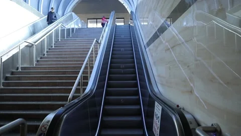 Escalators at train station and lit area Stock Footage 233992318