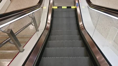 Escalators used to go to the underground metro station Stock Footage 294954704