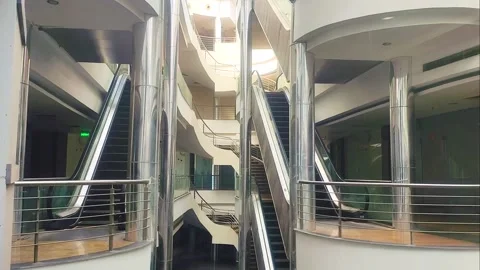 Escalators View From Elevator Moving Down Inside Shopping Mall Jan-02-2026 Stock Footage 327923921