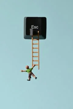 Escape Key and Miniature People Runaway on Ladder Stock Photos