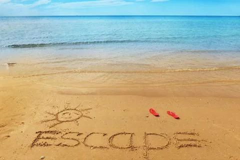 Escape message on the sand Stock Photos