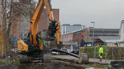 Escavator work in Ludvika city Stock Footage 245974255