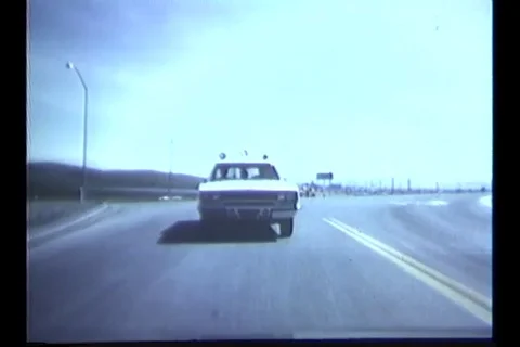 Escorting officer observes prisoner and exterior condition - 1969 Stock Footage 99028623