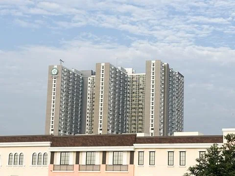 Esidential or condominium complex standing tall against a bright Stock Photos