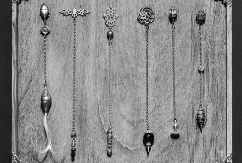 Esoteric magic pendulum. Vintage symbol of esoterism, withcraft and fortune-t Fotos Stock