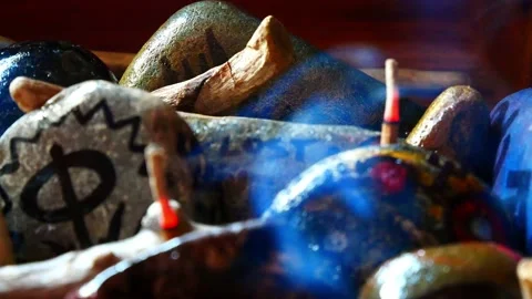 Esoteric painted Viking drawing patterned spiritual stones colourful hobby Stock Footage 158932528
