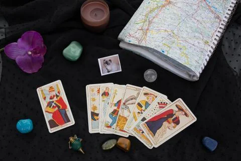 Esoteric table with astrological wheel, magic pendulum, tarots, Stock Photos