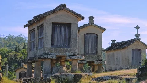 Espigueiros crowned on stone hill in Soajo settlement of Peneda-Geres Stock Footage 111866580