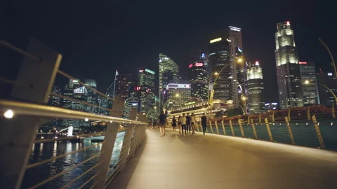 Esplanade Bridge And Downtown Core Skyscrapers In The Background Singapore Night Stock Footage 135012372