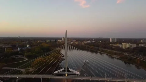 Esplanade Riel Cable-Stayed Bridge and Winding River Twilight Aerial View Stock-Footage 347536999