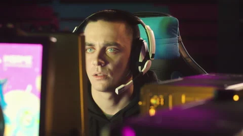 The esports player gets upset during the game, then laughs Video stock 149505540