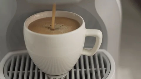 Espresso being made in capsule coffee machine Stock Footage 111585173