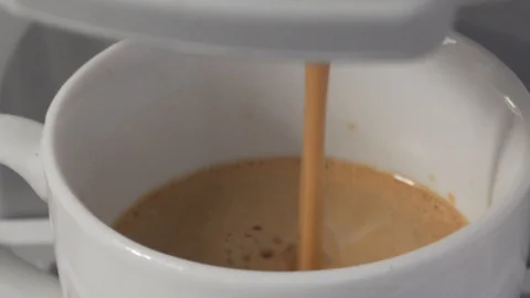 Espresso being made in coffee machine. Close up Stock Footage 98141309