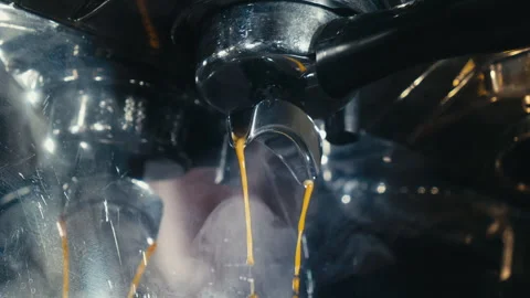 Espresso brewing in slow motion Stock Footage 242442613