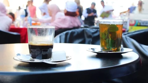 Espresso Coffee and a Mint Tea on a Cafe Table Stock Footage 92202859