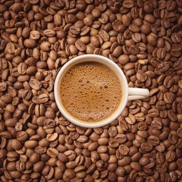 Espresso coffee with beans Stock Photos