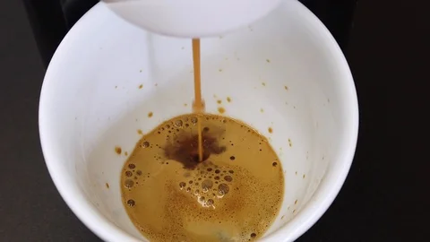 Espresso coffee brewing with fluffy foam Stock Footage 127362739