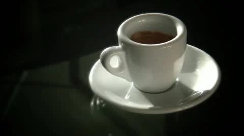 Espresso coffee on brilliant table Видео 12325424