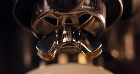 Espresso Coffee Dripping Out Of A Coffee Machine.Italian Roast Coffee Beans.  Stock Footage 108781026
