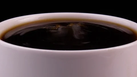 Espresso coffee drop into the filled Cup from the coffee machine in slow motion 스톡 동영상 124796225