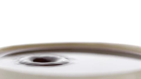 Espresso coffee drop into the filled Cup from the coffee machine in slow motion Video stock 126953180