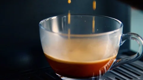 Espresso coffee drops in reverse. Video stock 115157202