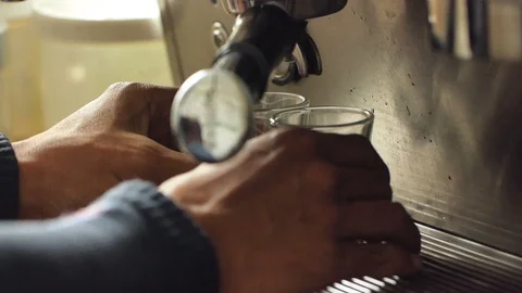Espresso coffee extraction with a coffee machine Stock Footage 124252597