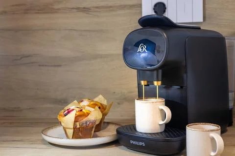 Espresso Coffee Machine Brewing Fresh Coffee With Muffins Stock Photos