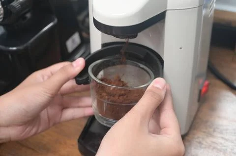 Espresso coffee machine with roasted coffee beans Stock Photos