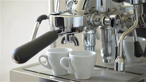 Espresso from a coffee machine for two cups. Stock Footage 75865907