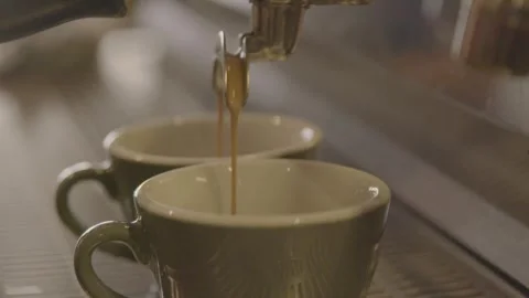 Espresso Coffee Pouring Into Cups From Machine in Sydney Cafe, Close-Up View Stock Footage 345693440