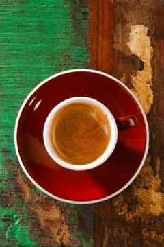 Espresso coffee on rustic table in brown cup Stock Photos