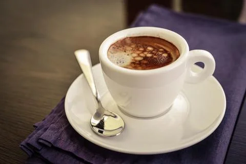 Espresso coffee in small white cup Stock Photos
