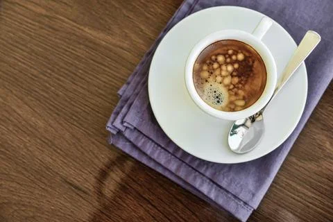 Espresso coffee in small white cup Stock Photos