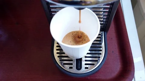 Espresso coffee stream from machine. Home making hot Espresso Stock Footage 149139404