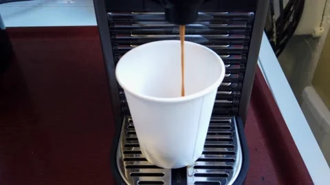 Espresso coffee stream from machine. Home making hot Espresso Stock Footage 149139409