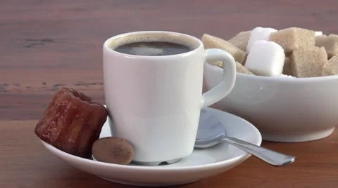 Espresso coffee, sugar and small cake Stock Footage 56514527