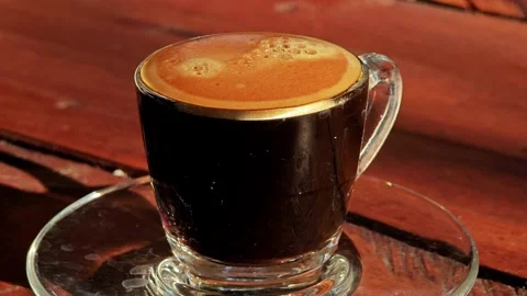 Espresso coffee in a transparent cup. Stock Footage 306924418