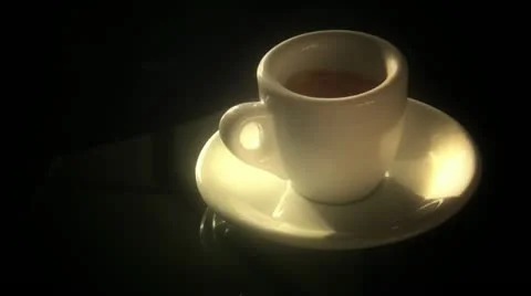 Espresso cup on the table Stockbeeldmateriaal 12325423