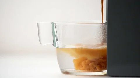 Espresso dip into the glass Stock Footage 126044812
