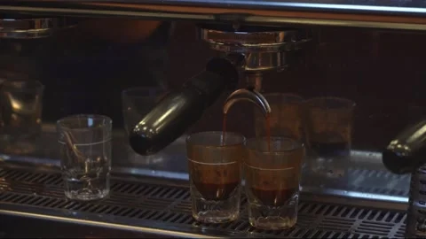 Espresso double shot brewing at a coffee shop Stock Footage 319764279